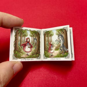 May include: A set of three ceramic mugs with a speckled, matte finish. The mugs are in shades of cream, light gray, and dark gray. Each mug has a simple, minimalist design, perfect for coffee or tea.