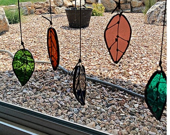 Hanging stained glass sun catcher leaves on wood branch boho purple amber teal blue and green leaves window and wall art