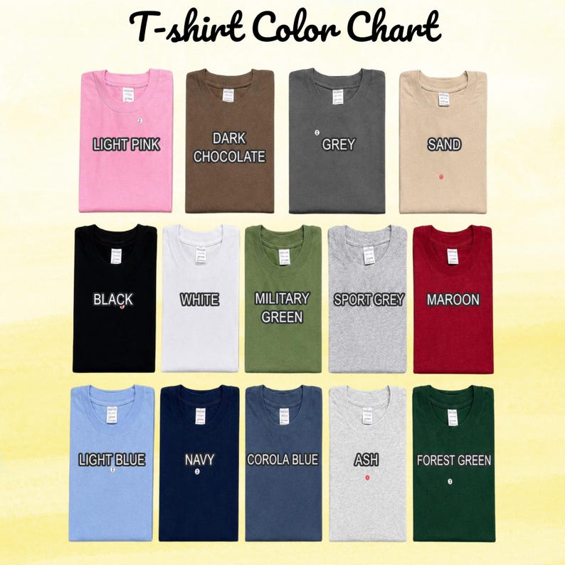 May include: A T-shirt color chart displaying fourteen folded shirts in various colors including light pink, dark chocolate, grey, sand, black, white, military green, sport grey, maroon, light blue, navy, corola blue, ash, and forest green.