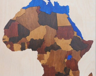 Chunky piece wooden Map Puzzle of Africa - artistic, educational,  and fun - learn countries and capitals,. May be hung for display.