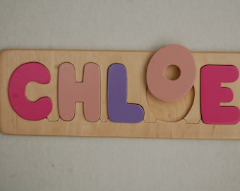 Wooden Name puzzle  with raised pieces -  up to 9 chunky letters. Perfect birth, birthday, Christmas gift. By Puzzle People of California.