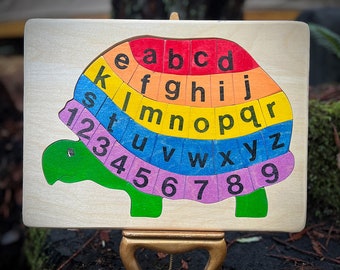 ABC Turtle  wood puzzle in rainbow colors makes a fun and educational wooden toy for children. This classic toy will be kept for generations