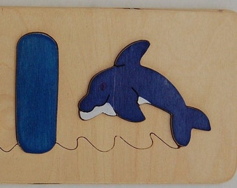 Wooden Name Puzzle with added DOLPHIN shape- cool gift for baby boys or girls - an educational toy that is fun for kids