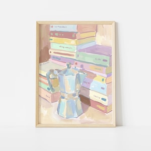 May include: A framed painting depicting a silver moka pot centered in front of a stack of colorful books. The books feature various pastel spines with visible text including Les Miserables, Fables, and Folio. The art uses soft brushstrokes.