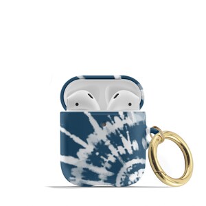 May include: A blue and white tie-dye patterned Airpods case with a gold metal ring attached. The case is open, revealing the white Airpods inside.