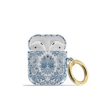 Peut inclure: Un &eacute;tui blanc pour Airpods avec un motif floral bleu et blanc et un porte-cl&eacute;s en m&eacute;tal dor&eacute;.