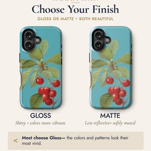 two phone cases with a cherry tree design, one with a glossy finish and the other with a matte finish. The text indicates that the user can choose between a glossy or matte finish for their phone case, and that the colors and patterns of the case will look their most vivid.