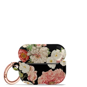 May include: A black floral print protective case for wireless earbuds with a rose gold carabiner clip.