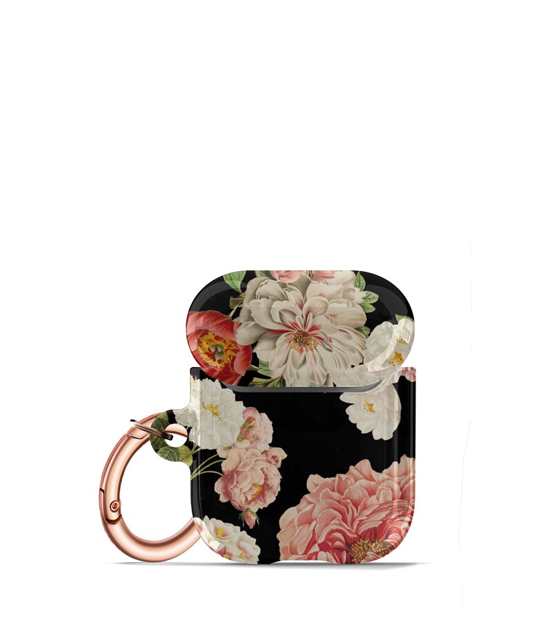 May include: A black floral print Airpods case with a rose gold carabiner clip. The case has a floral pattern with pink, white, and red flowers on a black background.