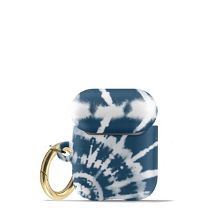 May include: A blue and white tie-dye Airpods case with a gold metal ring.
