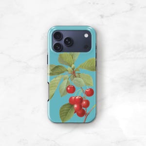 a phone case with a design of cherries on a branch, with red cherries and green leaves.