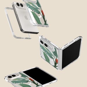 a clear phone case with a tropical leaf design, including a red flower, on a white background.