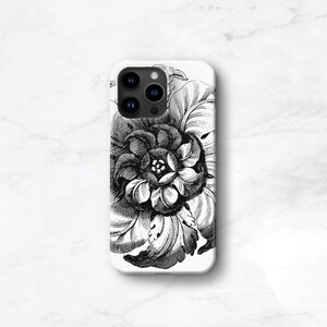 May include: White phone case featuring a detailed black and white floral design. The illustration depicts a large, stylized flower with intricate petal and leaf patterns. The case has a glossy finish and a camera cutout.