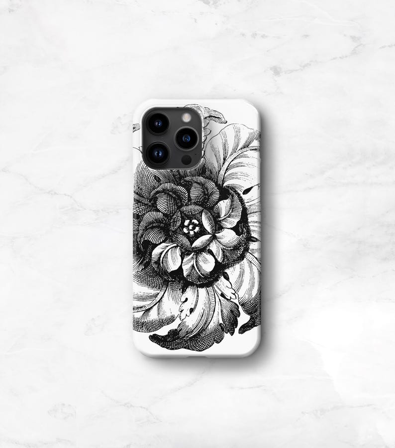 May include: White phone case featuring a detailed black and white floral design. The illustration depicts a large, stylized flower with intricate petal and leaf patterns. The case has a glossy finish and a camera cutout.