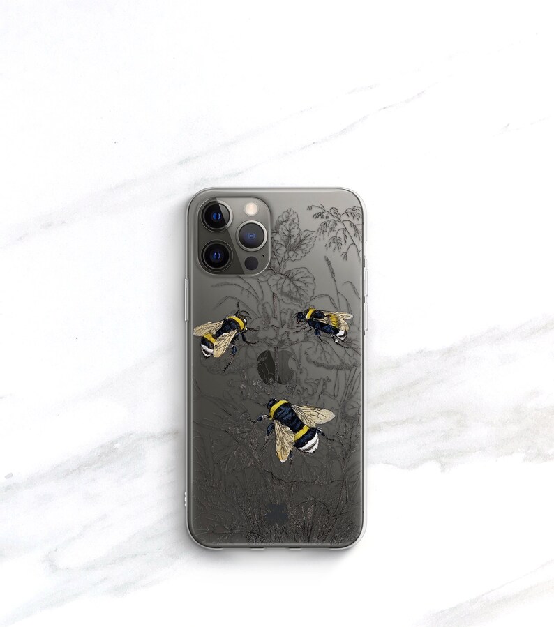 May include: Clear phone case with a black and white floral design and three yellow and black bumblebees.