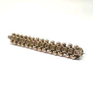 Broche de estrela com frente em ouro rosa laminado vitoriano