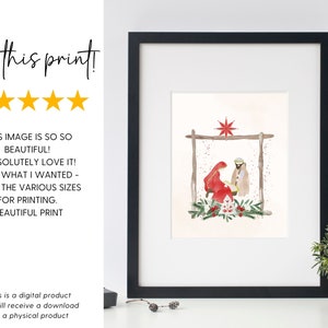 May include: A watercolor painting of the nativity scene with Mary, Joseph, and baby Jesus in a manger. The scene is set in a rustic barn with a star above. The painting is framed in a black frame and is hanging on a white wall.