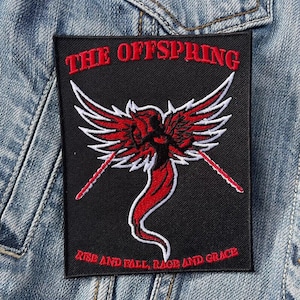 May include: Black and red embroidered patch with the band name "The Offspring" and the album title "Rise and Fall, Rage and Grace". The patch features a stylized red and white winged creature.