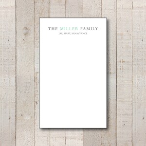 May include: White notepad with black border and the text "THE MILLER FAMILY JAY, MARY, SAM & VANCE" at the top.