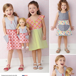 May include: A sewing pattern for a girl's dress with a pocket. The pattern includes three different styles of dresses, all with a colorful geometric print. The pattern is designed by Modkid Studio and is available in sizes for girls aged 2-8.