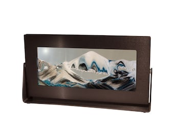 Arte de arena en movimiento: Glaciar Ártico, marco de metal anodizado transparente (18 x 30 cm)