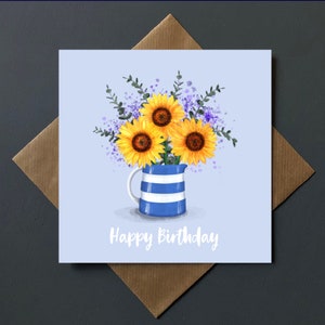 Carte de joyeux anniversaire, un pichet de Cornouailles débordant de fleurs de jardin de cottage, vide à l'intérieur