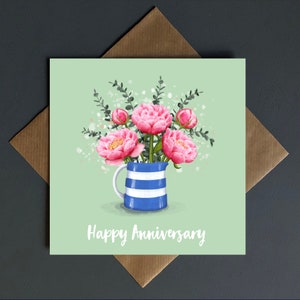 Carte d'anniversaire, un pichet de Cornouailles débordant de fleurs de jardin de cottage, vide à l'intérieur