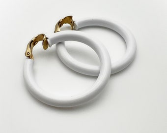 Boucles d'oreilles clip vintage Lewis Segal en émail blanc