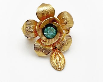 Vintage  Gold Tone Metal Flower Brooch with Aqua Blue Gem and Dangling Virgin Mary Charm