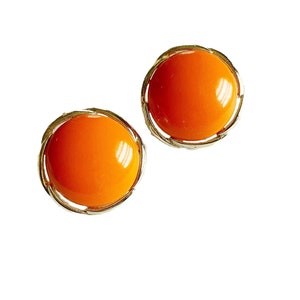 Vintage Orange Plastic Disc Earrings in Gold Tone Metal Frame Clip On