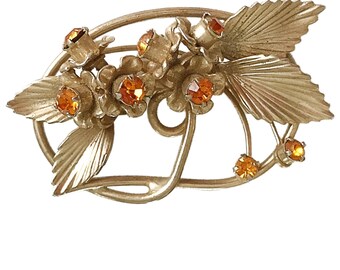 Broche vintage en strass orange et strass