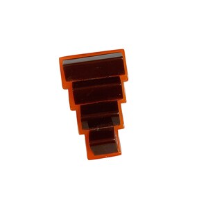 Pince à robe orange et marron en bakélite vintage
