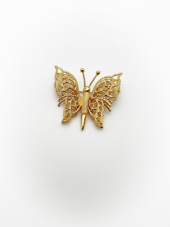 Vintage Monet Gold Tone Metal Butterfly Brooch - image 1