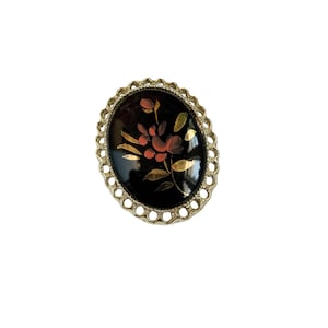 Vintage Hand Painted Gold and Orange Flower Brooch Pendant on Black Oval Cabochon in Decorative Gold Tone Metal Frame