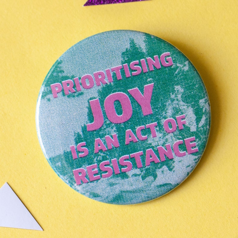 Prioritising Joy Is An Act Of Resistance 59mm badge image 1
