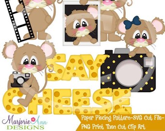 May include: A digital paper piecing pattern featuring cute cartoon mice with a camera, film strip, and photo frame. The text "Say Cheese" is written in yellow with a cheese pattern.