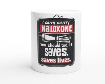 Taza de cerámica blanca de 11 oz con texto "I Carry Naloxone"