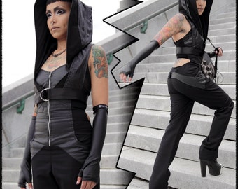 Salem, hooded mini vest with adjustable harness belt by Plastik Wrap.