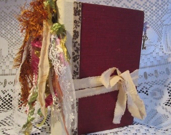 Journal handmade, flower themed w/ removable spine dangle & paperclip bookmark, 224 pages, 5 signatures, assorted papers (See Youtube video)