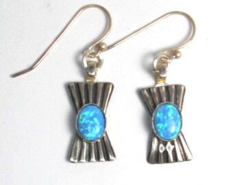 Sterling silver tribal dangle earrings with blue lab opal, 1 3/8" long.