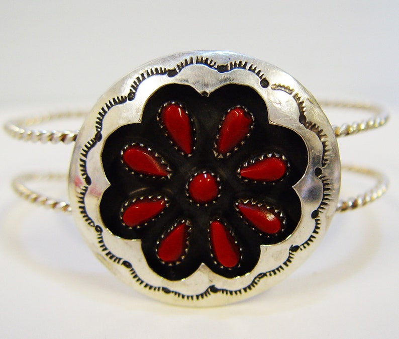 sterling silver twisted rope arms. Cuff bracelet with red coral shadowbox concho
