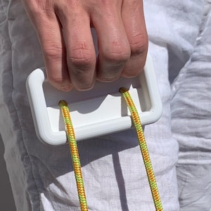 Tablero móvil para colgar y ejercitador de dedos blanco