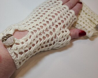 Fingerless Gloves Crocheted in a Cream Color Lacy Pattern