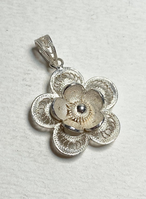 Beautiful handmade flower done in sterling silver 