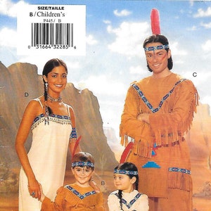 May include: Butterick P445 sewing pattern envelope featuring four costumes with fringe and geometric trim. Includes a white sleeveless dress, a tan long-sleeve tunic with pants, a tan long-sleeve tunic with a skirt, and a tan long-sleeve tunic with pants.