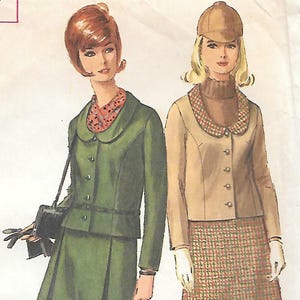 May include: Vintage Simplicity pattern 6177 featuring two women's outfits. One is a green skirt suit with a matching jacket and a black purse. The other is a tan skirt suit with a matching jacket and a brown hat. The pattern is for a Junior size 9, bust 30 1/2 inches.