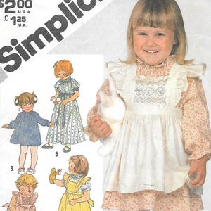 1980s Simplicity 5293 Toddlers Peasant Dress and Smocked Pinafore Vintage Sewing Pattern Size 1 Breast 20 in