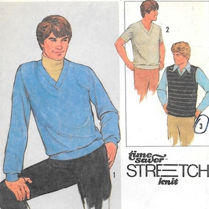 May include: A sewing pattern envelope featuring illustrations of three garments: a light blue V-neck long-sleeve sweater, a light grey V-neck short-sleeve shirt, and a dark striped sweater vest. The text reads time saver STRETCH knit.