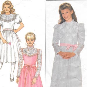 May include: Illustration of three dresses. One is white with a lace collar and short sleeves, another is pink with lace sleeves and a pink bow, and the third is gray with long sleeves and a pink bow. All dresses have a vintage style.