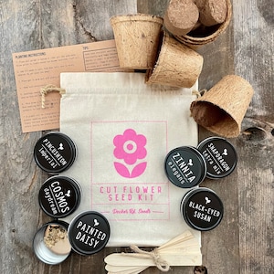 May include: A cut flower seed kit with eight different seed packets, including Zinnia, Snapdragon, Black-Eyed Susan, Cosmos, Painted Daisy, and Pincushion Imperial. The kit also includes six biodegradable pots and six wooden plant markers.